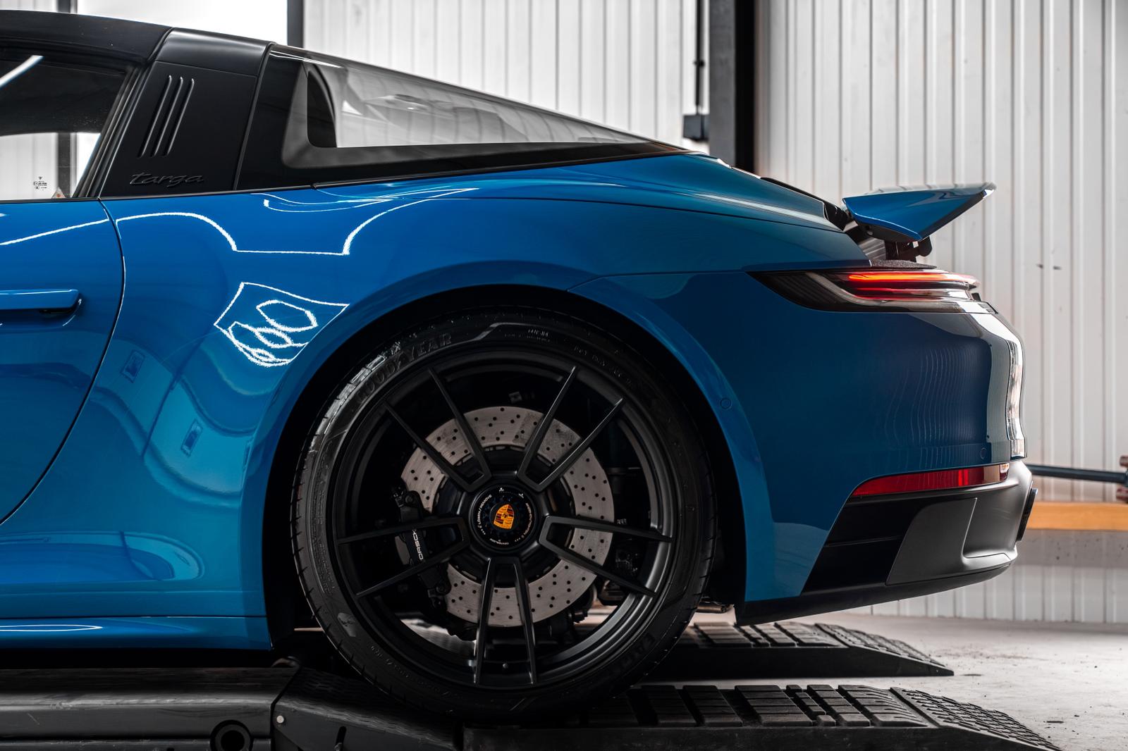 Blue Porsche 911 Targa 4 GTS rear wheel detail